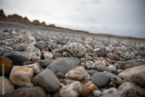 Rocks along Gwithian Beach on the coast of Cornwall, UK.
