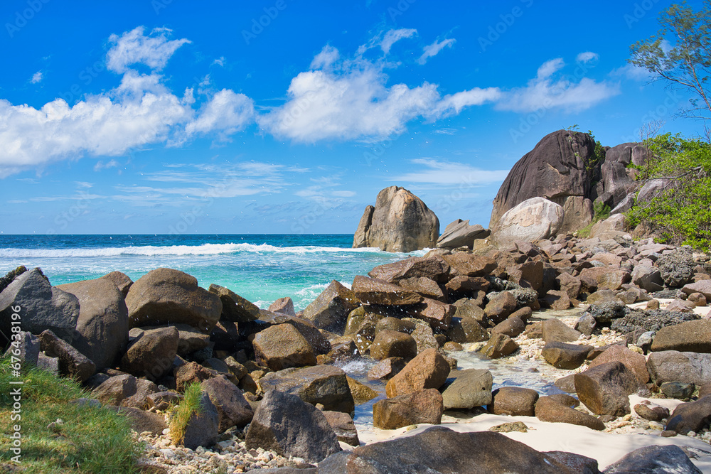 Sunny, white sandy beach, huge granite rocks at port glaud beach, Mahe, Seychelles 1