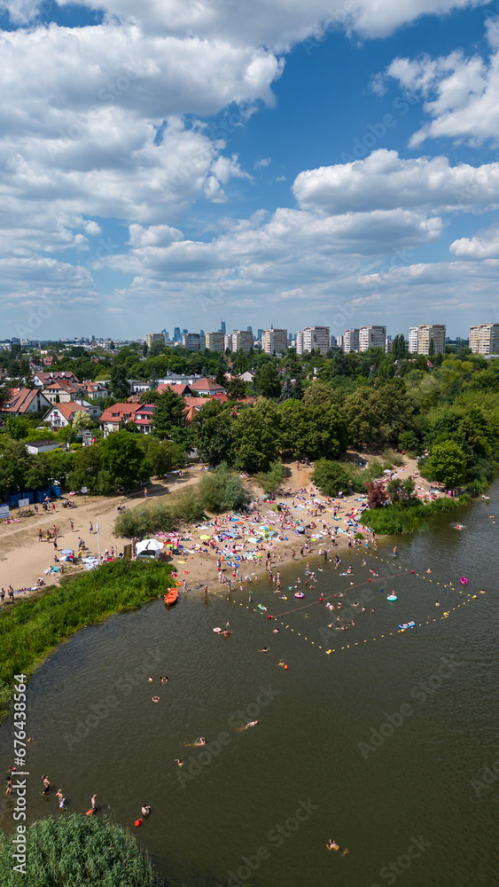 drone view of the lake beach in the city