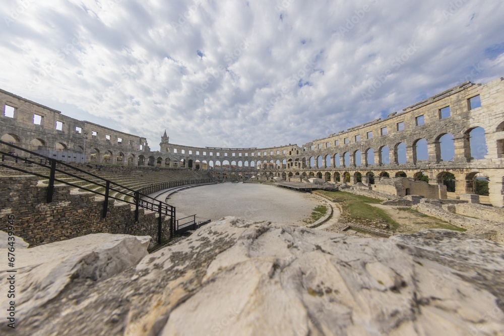 Fototapeta premium View inside the Roman amphitheater in the Croatian city of Pula without people