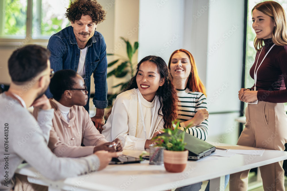 Group of multiethnic business people working together in the office Group of multiethnic business people working together in the office