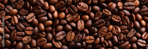 Roasted Coffee beans background  texture and copy spase  panorama top view.