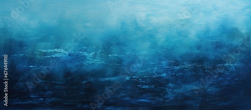 The abstract painting of a blue sea with an old textured steel background captures the mesmerizing pattern and light reflections of the underwater surf