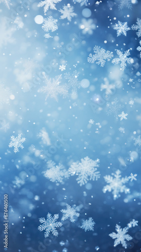Falling snowflakes against a blue wintery background