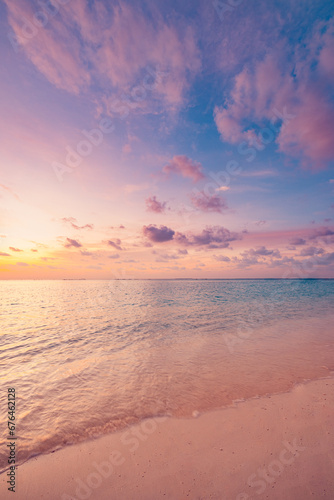 Fototapeta Naklejka Na Ścianę i Meble -  Closeup sea waves beach horizon. Panoramic beach landscape. Paradise tropical beach summer seascape. Colorful sunset sky, soft sand, calmness, tranquil relaxing sunlight. Inspire meditation vacation