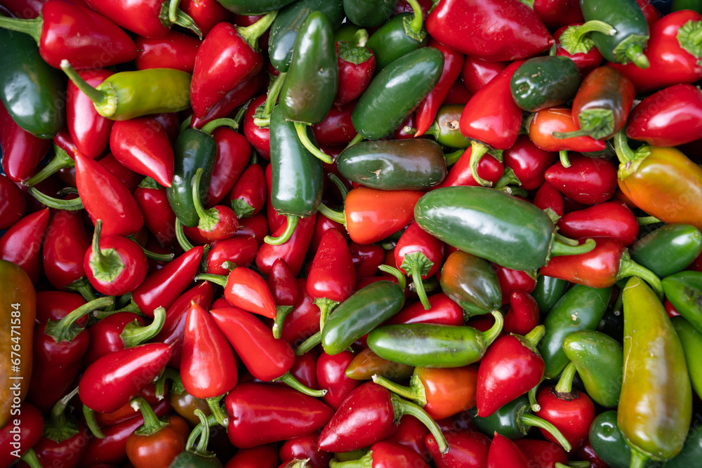 detail of mature reddish colors. Texture of many bell peppers harvested in the market detail of mature reddish colors. Texture of many bell peppers harvested in the market