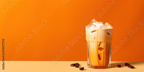 Delicious Iced Latte or Cappuccino an Orange Background