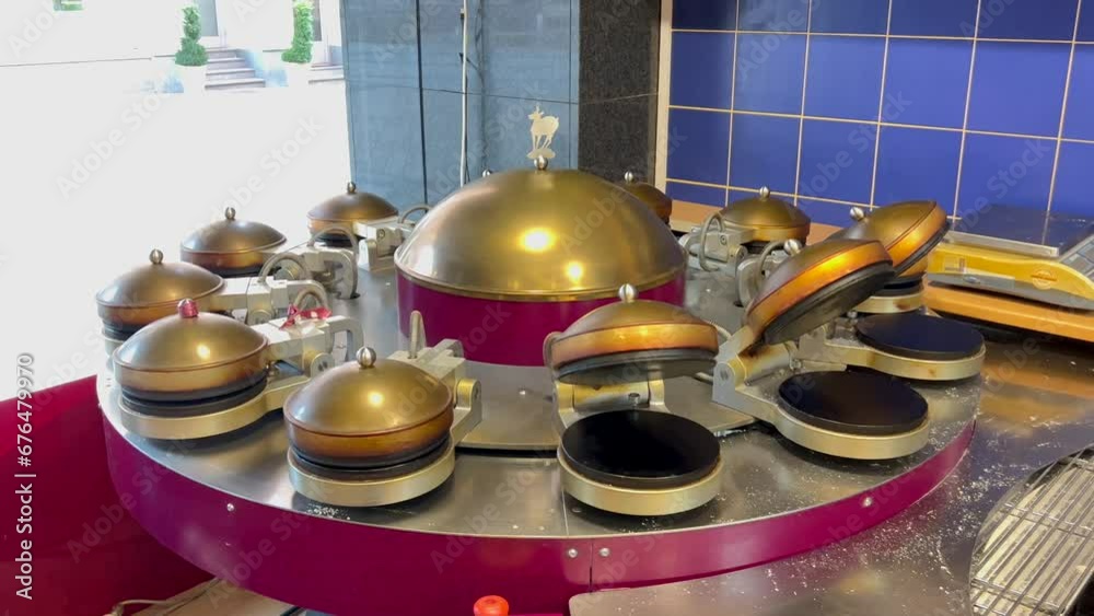 Machine for baking pancakes. Karlovy Vary. the Czech Republic Machine for baking pancakes. Karlovy Vary. the Czech Republic