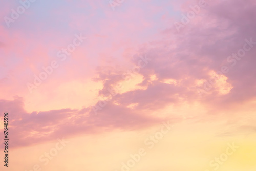 Fototapeta Naklejka Na Ścianę i Meble -  Majestic dusk. Sunset sky twilight in the evening with colorful sunlight. Pastel colors. Abstract nature background. Moody pink, purple and yellow clouds sunset sky.