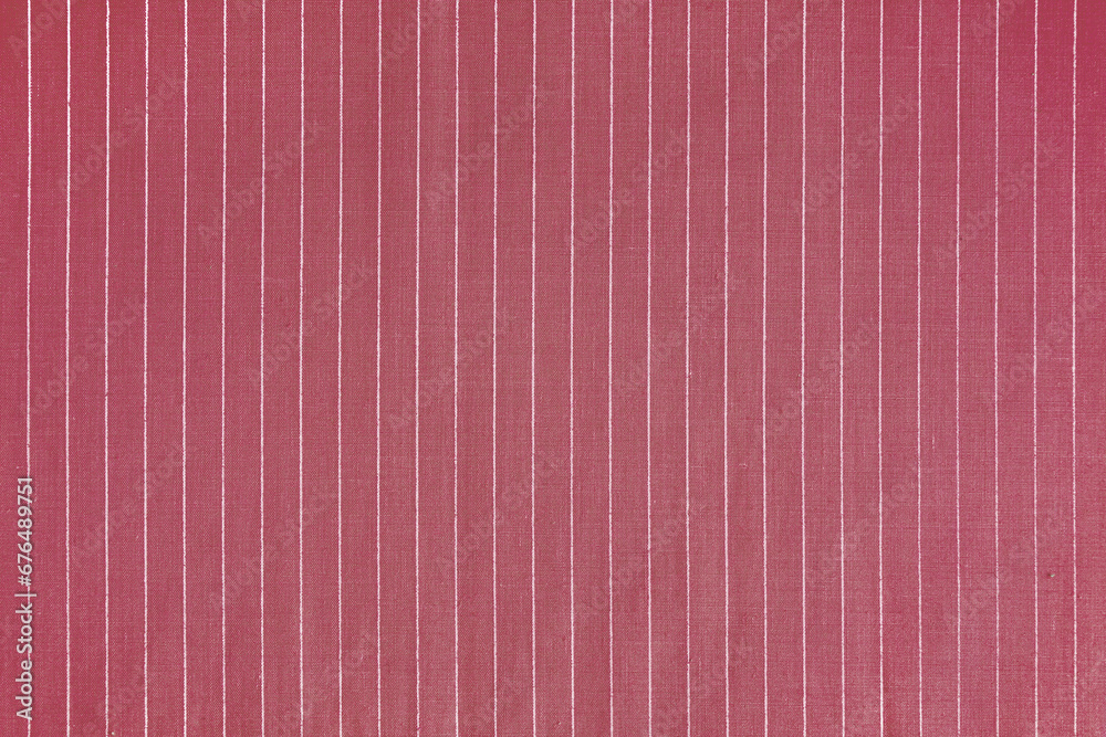 Striped red white fabric texture background wtih copy space. Shirt fabric, tablecloth textile, garment cloth, upholstery with classic pattern with lines. Backdrop, wallpaper, background. Striped red white fabric texture background wtih copy space. Shirt fabric, tablecloth textile, garment cloth, upholstery with classic pattern with lines. Backdrop, wallpaper, background.