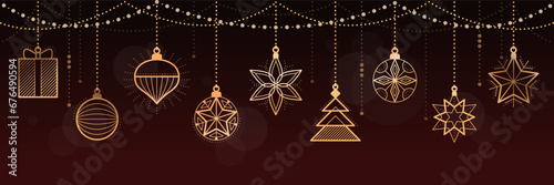 Christmas banner with hanging decoations photo