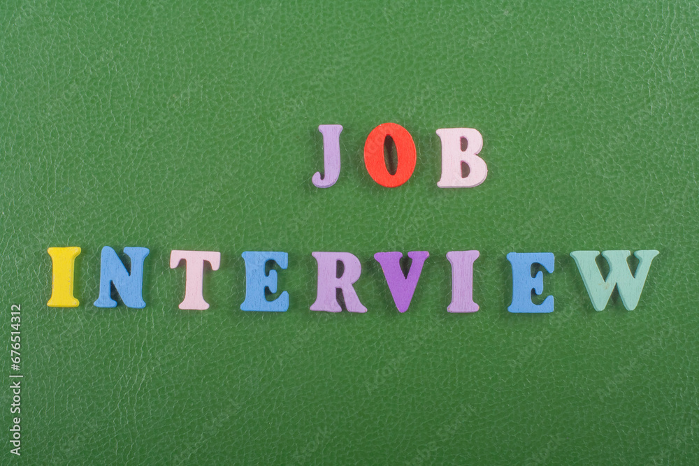 JOP INTERVIEW word on green background composed from colorful abc alphabet block wooden letters, copy space for ad text. Learning english concept. JOP INTERVIEW word on green background composed from colorful abc alphabet block wooden letters, copy space for ad text. Learning english concept.