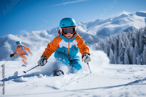 Niño esquiando en montaña cubierta de nieve photo