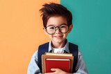Funny smiling child school boy with glasses hold books. ai generative