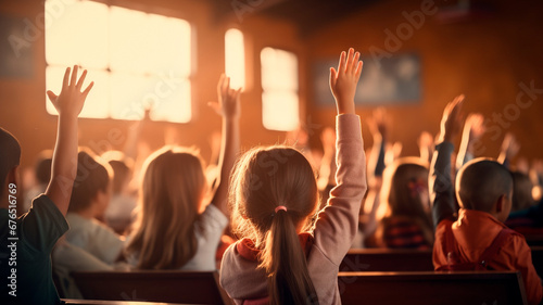 kids raising hands at school, education and learning concept