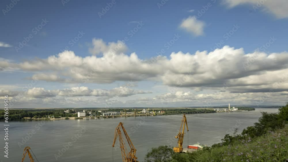 Clouds above the river with ferry in the water Clouds above the river with ferry in the water