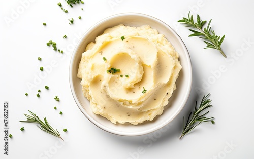 A Bowl of Creamy Mashed Potatoes Topped with Fresh Green Herbs