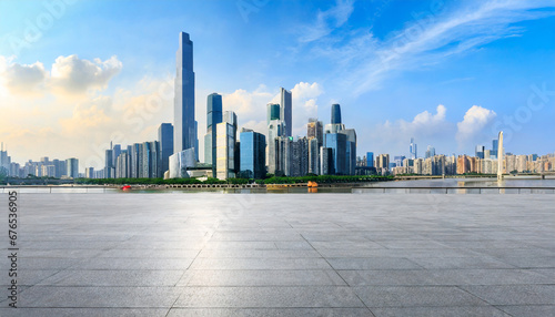 empty square floor and city skyline with modern buildings in guangzhou guangdong province china panoramic view photo