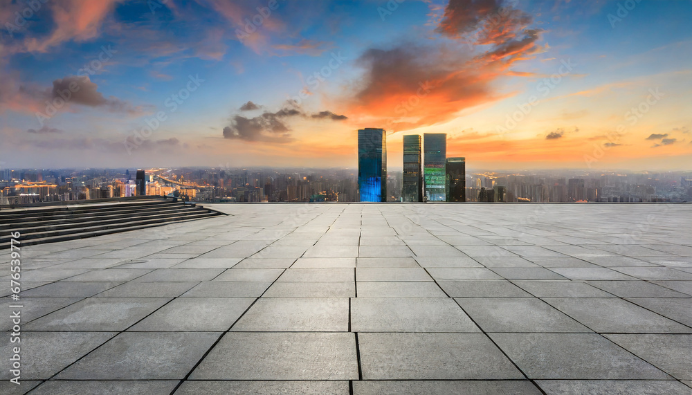 empty square floors and city skyline with modern buildings at sunset