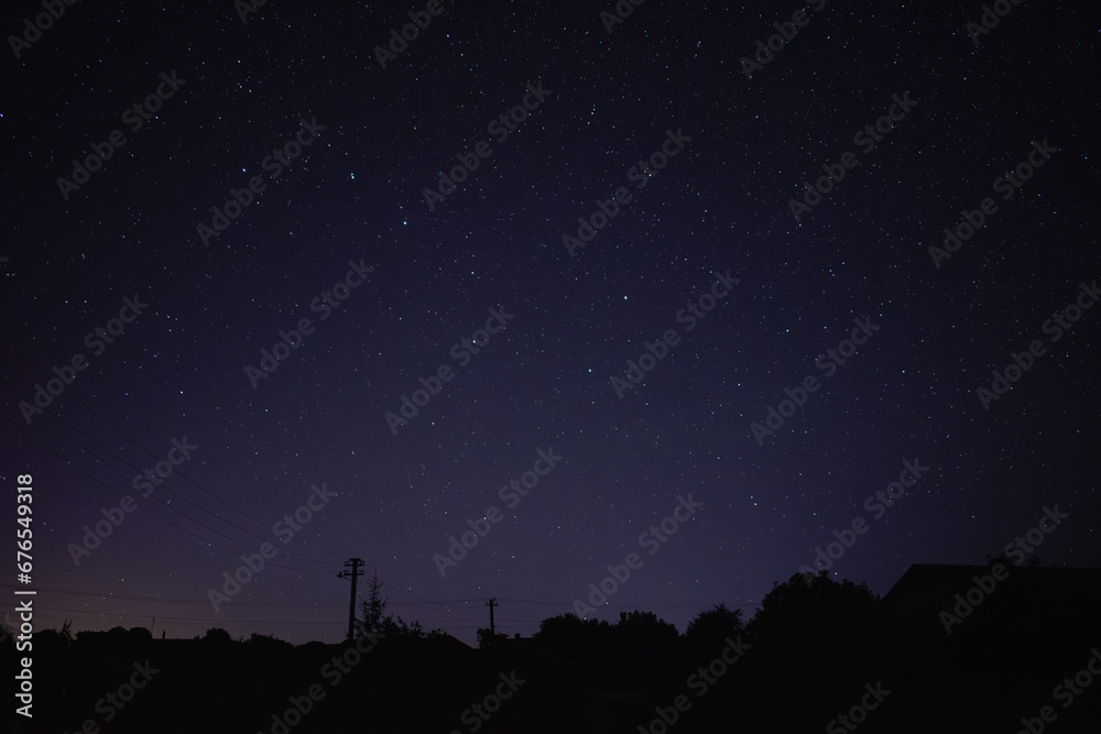 Beautiful landscape of Milky Way in the village during Starfall