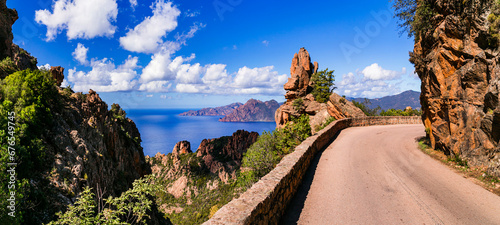 Nature of Corsica, France. Amazing red rocks of Calanques de Piana. famous route and travel destination in west coast of the island in gulf of Porto. photo