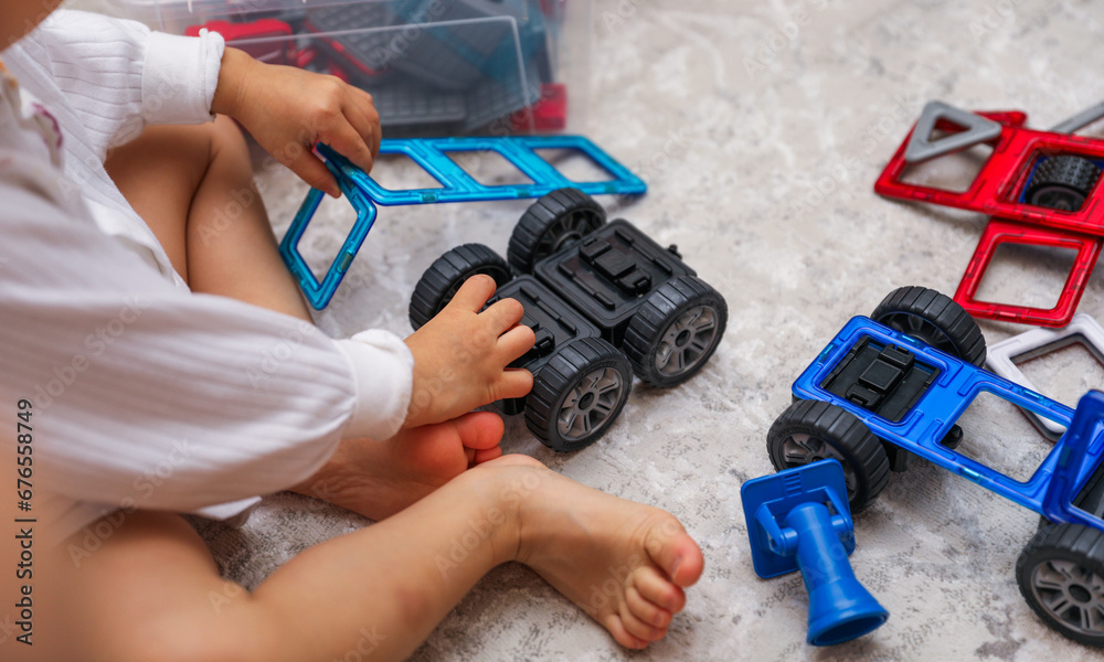 Children's colorful toys, tiny legs, and building blocks scattered on the floor, a playful scene of early childhood development Children's colorful toys, tiny legs, and building blocks scattered on the floor, a playful scene of early childhood development
