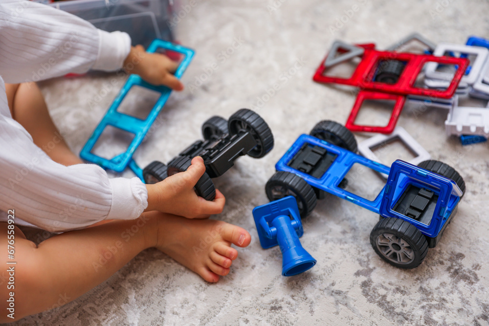 Children's colorful toys, tiny legs, and building blocks scattered on the floor, a playful scene of early childhood development Children's colorful toys, tiny legs, and building blocks scattered on the floor, a playful scene of early childhood development