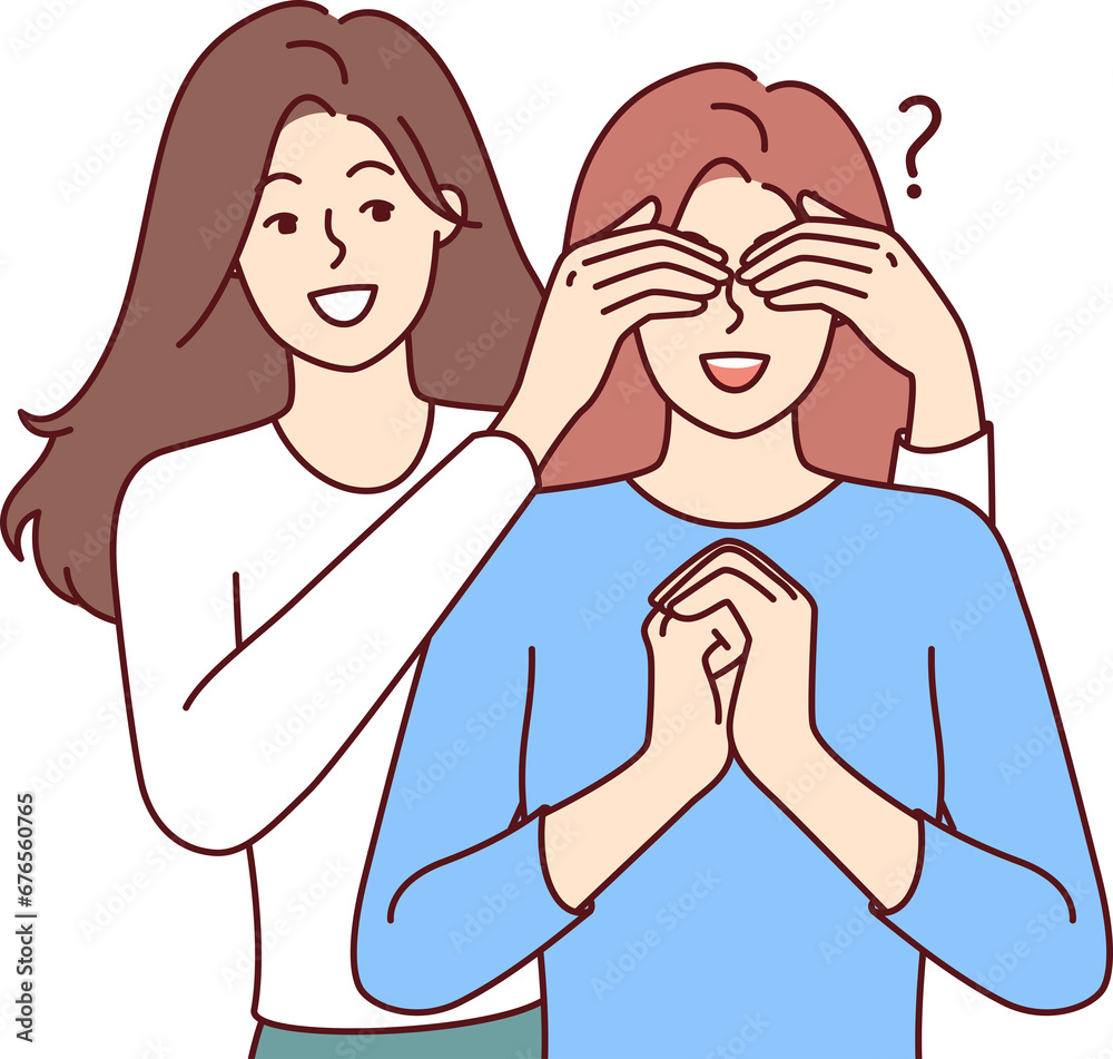 Happy woman closes sisters eyes, coming up from behind and making surprise, asking riddle who it is Happy woman closes sisters eyes, coming up from behind and making surprise, asking riddle who it is
