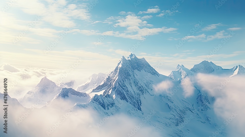  a view of the top of a mountain with clouds in the foreground and a blue sky in the background.  generative ai