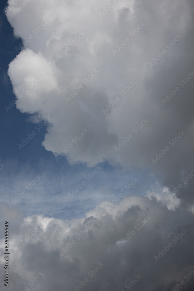 Obraz premium Blue sky. Beautiful Cumulus clouds flying across the sky, Beautiful natural clouds on the sky, deep blue sky