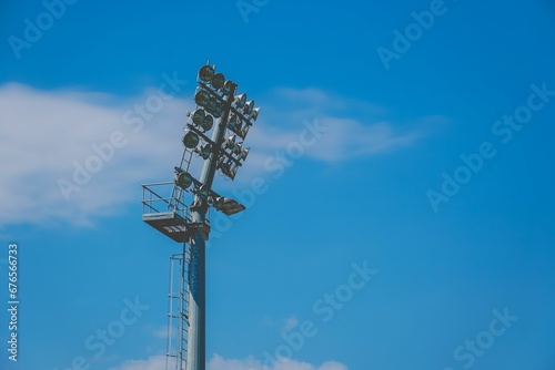 Base station of a football field with a blue sky background