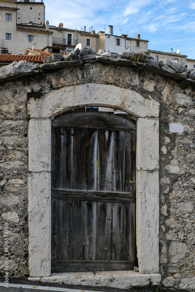 Old vintage door in Civitella Alfedena, Abruzzo, small village in Italy in the autumn, concept of tranquility and relax.