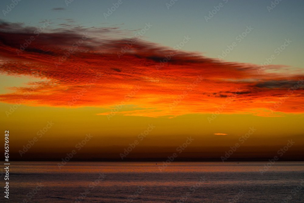 pre-dawn clouds over the ocean