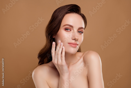 Photo of stunning pretty girl touch gentle skin after hydrating cream isolated on pastel color background