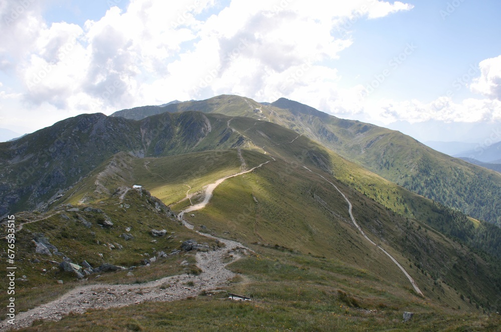 Beautiful landscape of the big mountains of the Alps in Italy under the blue sky on a sunny day