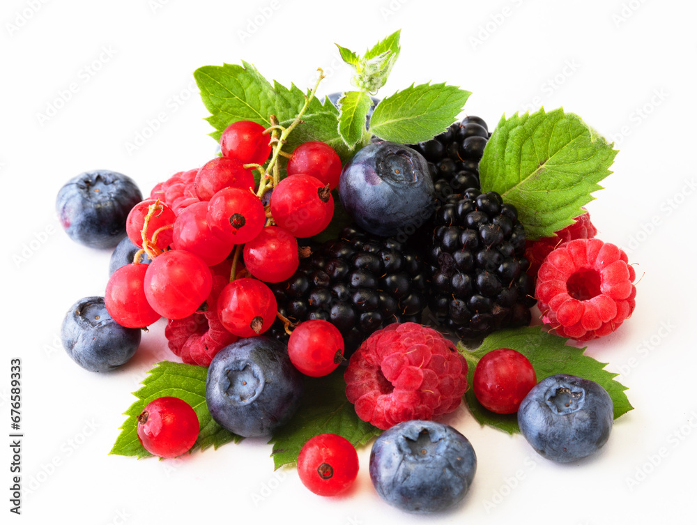 Mix berries with leaf of mint over white background Mix berries with leaf of mint over white background