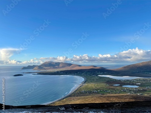 Beautiful shot of a landscape under the white clouds in the sky