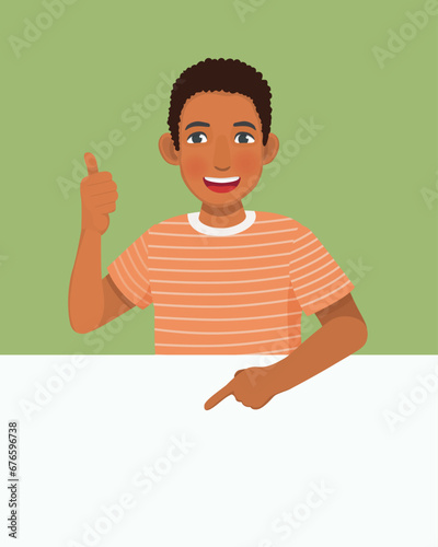 Young African man standing behind blank board showing thumb up pointing finger to empty banner for copyspace advertising