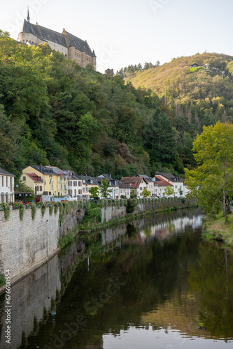 Views of Vianden commune with town status in Oesling, north-eastern Luxembourg, capital of  canton of Vianden lies on the Our river, near border between Luxembourg and Germany. photo