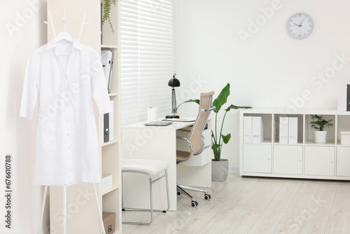 Modern medical office with doctor's workplace in clinic © New Africa