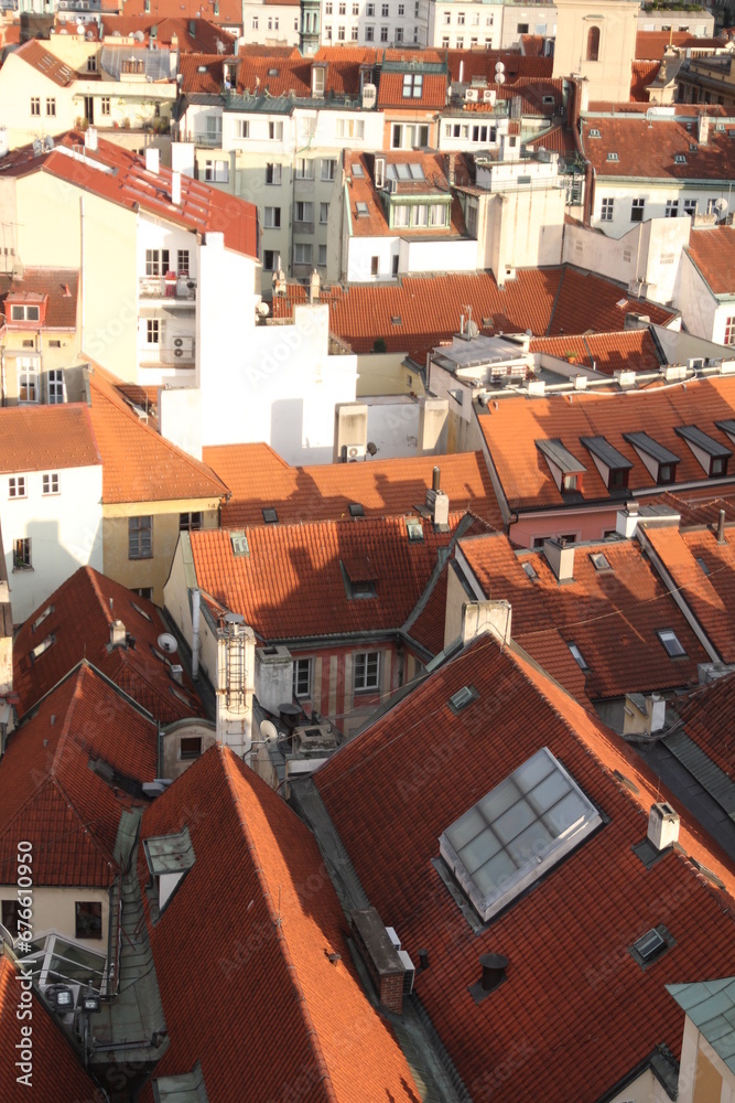 From above, the city sprawls with quaint red roofs