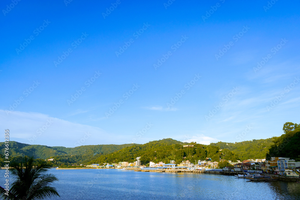 View of the town by the Romblon Bay in the afternoon. Romblon Island, Philippines