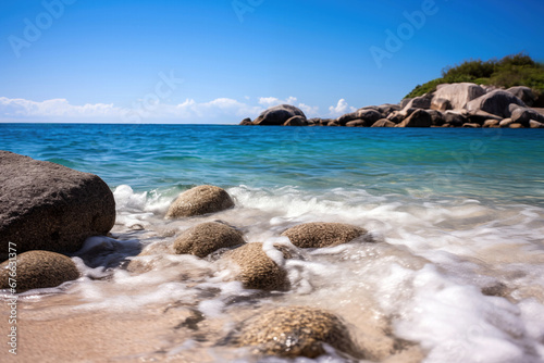 Beautiful seascape with pebble beach and blue sky background. High quality photo © oksa_studio