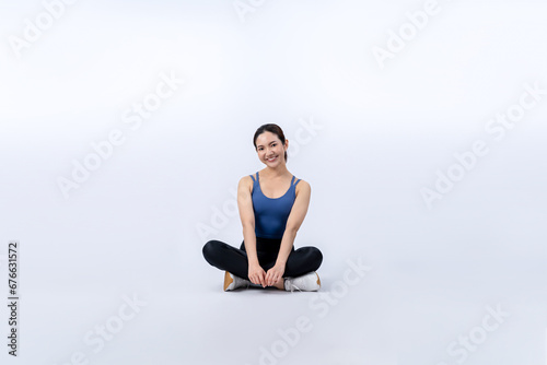 Full body asian woman in sportswear portrait  smiling and posing cheerful gesture. Workout training with attractive girl engage in her pursuit of healthy lifestyle. Isolated background Vigorous