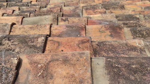 traditional Indonesian clay roof tiles. old roof tiles made of clay. side view.