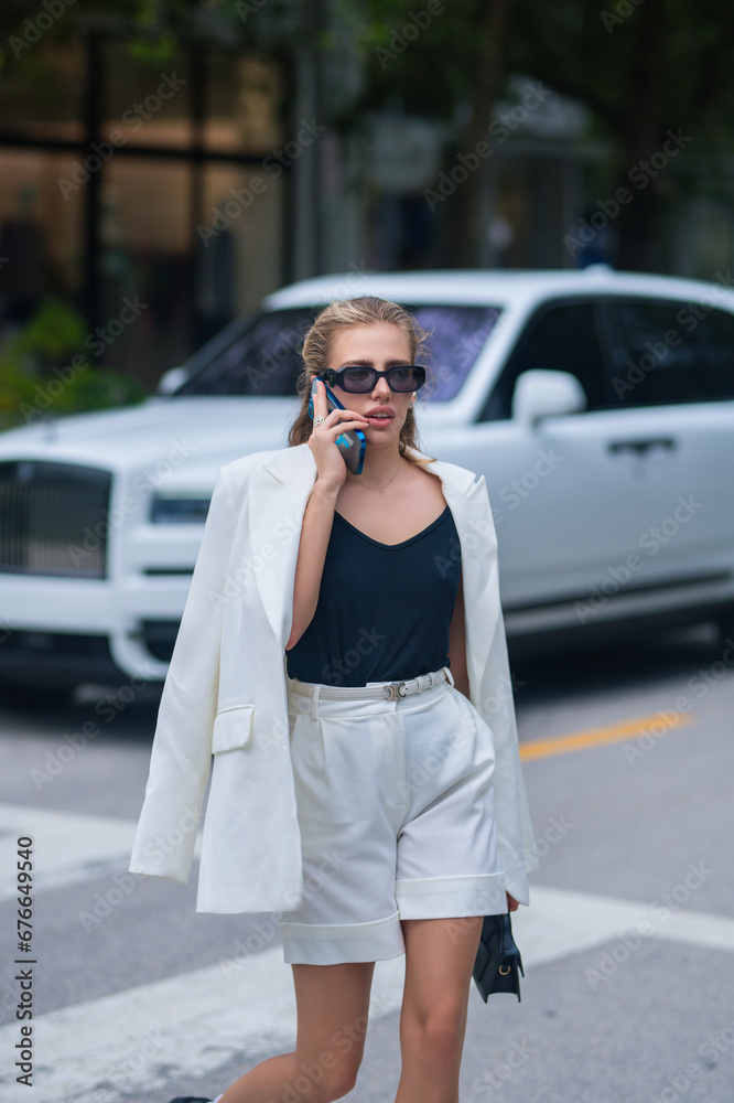 Fashion model woman on street. Girl style.