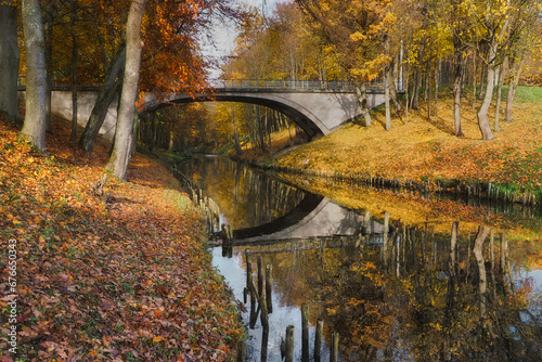 A small river in autumn colors, near the town of Pasłek, Warmian-Masurian Voivodeship, Poland