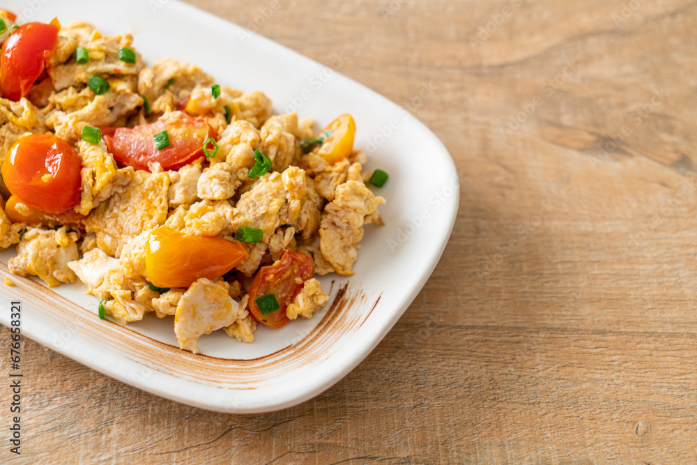 stir-fried tomatoes with egg on plate stir-fried tomatoes with egg on plate