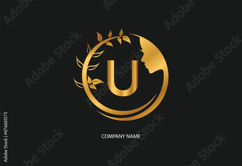 Beauty logo initial letter U with golden style color and leaf. Natural beauty logo template