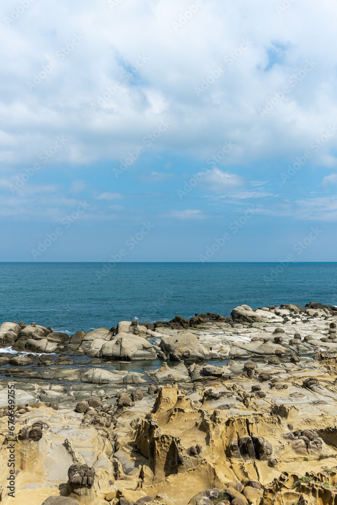 The landscape of the coastal rock at Heping Island Park in Keelung City, Taiwan, Sky and sea horizon.